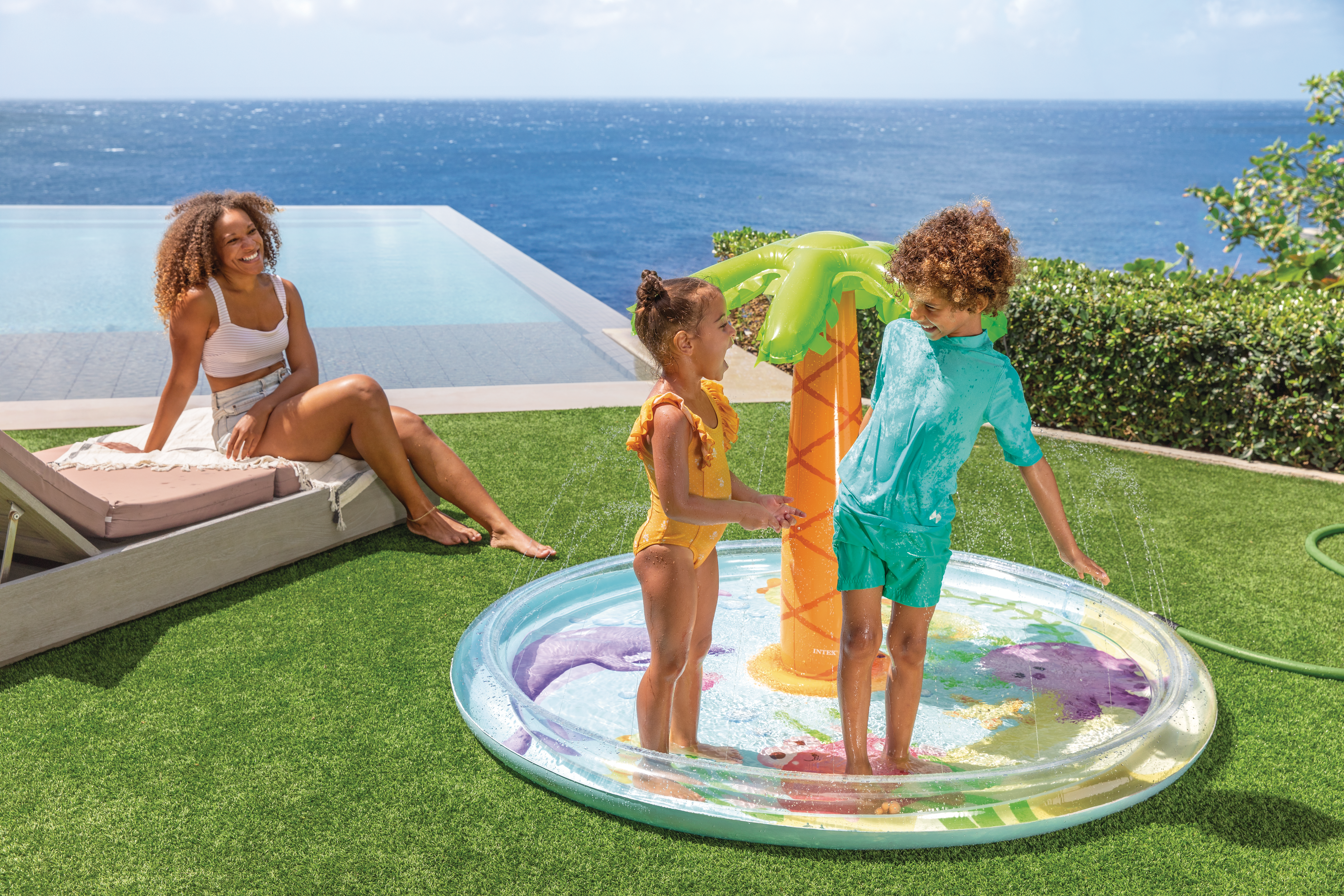 Надувний басейн з оприскувачем Palm Tree